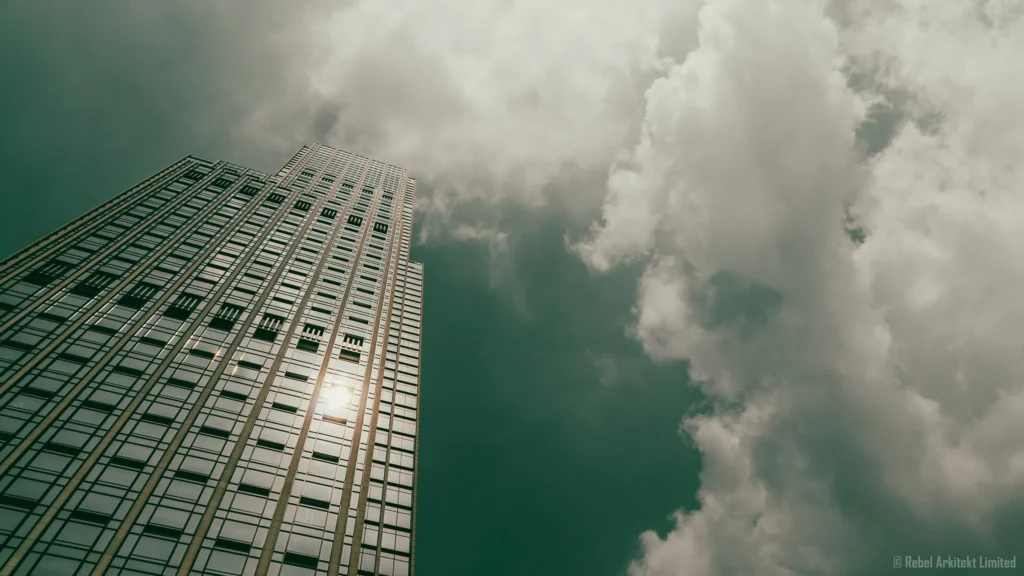 Skyward view of a towering skyscraper glistening in sunlight against a dynamic cloudy backdrop, captured by Rebel-i, the photography division of Rebel Arkitekt.