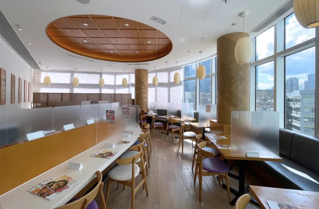 Bright and spacious pre-renovation dining area at DONDONYA x TORIKAI, filled with natural light and simple, functional décor.