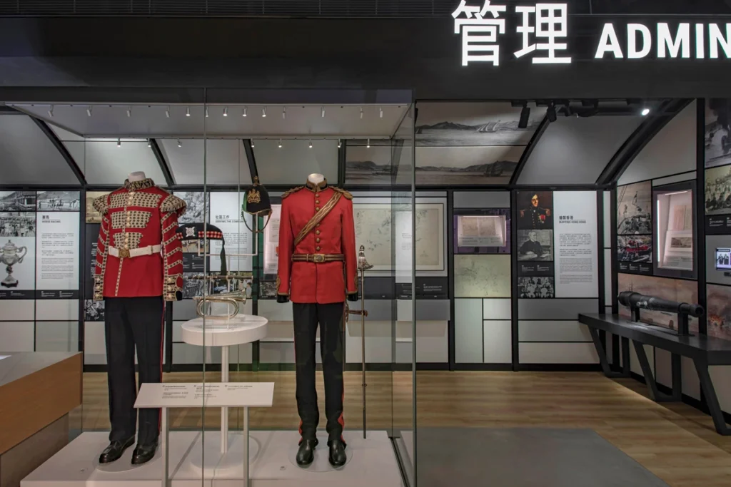 Administration exhibit featuring historic military uniforms at the Hong Kong Museum of Coastal Defence, offering an immersive glimpse into military heritage.