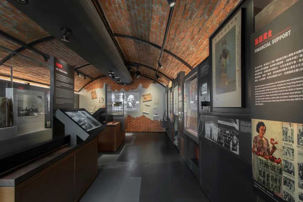 Financial Support exhibit at the Hong Kong Museum of Coastal Defence, illustrating community-driven fundraising efforts during wartime.