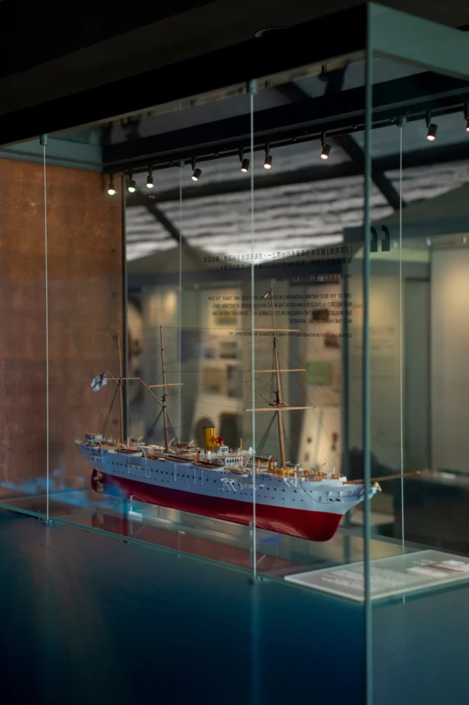 Detailed model of a historical naval ship displayed at the Hong Kong Museum of Coastal Defence.