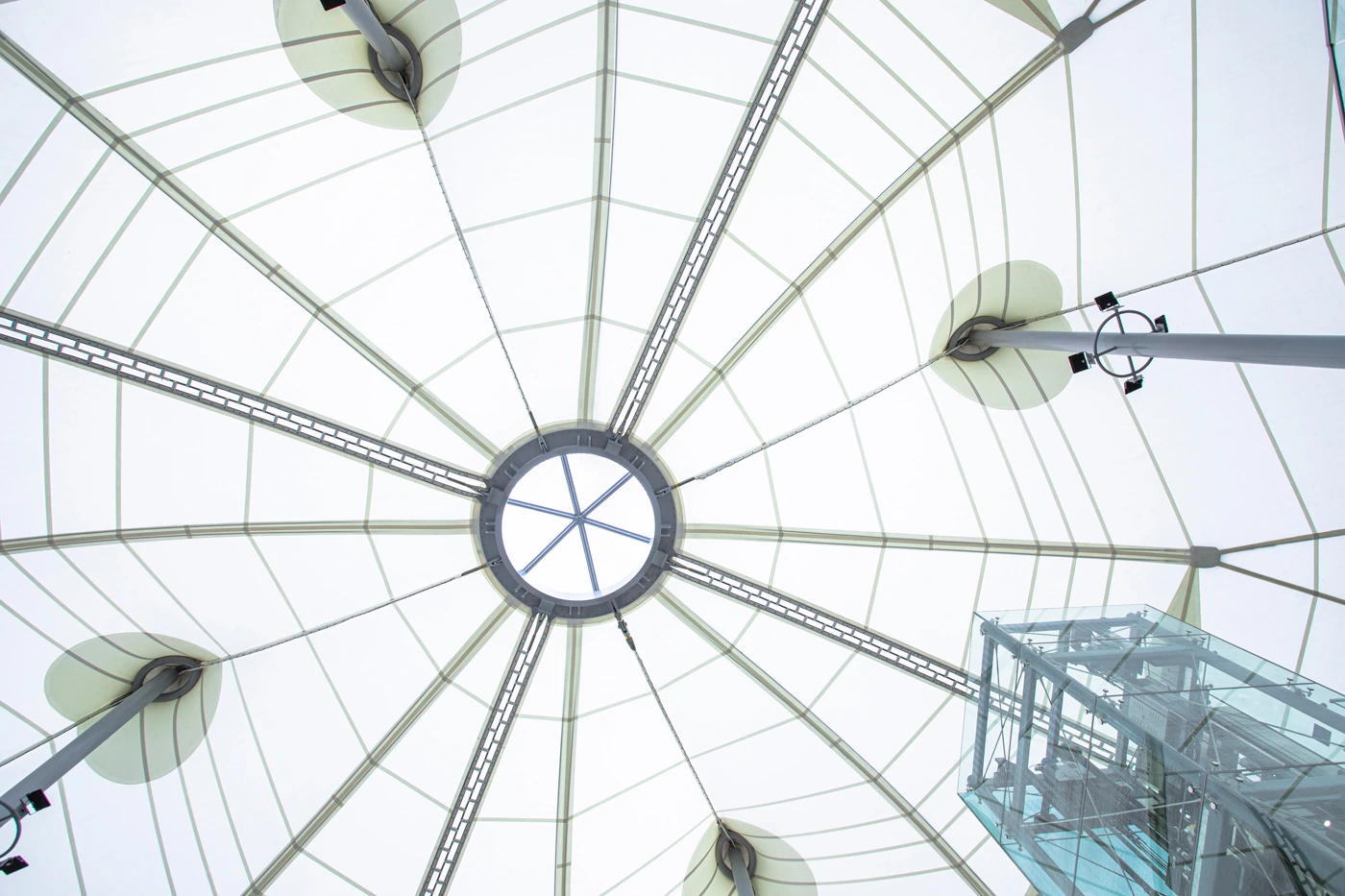 View of the tensile roof structure at the Hong Kong Museum of Coastal Defence, highlighting its architectural design and circular skylight